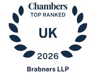 Chambers top ranked UK 2026 badge with a laurel wreath border and text in blue on a white background.