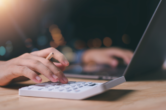 A business owner reviews the company accounts