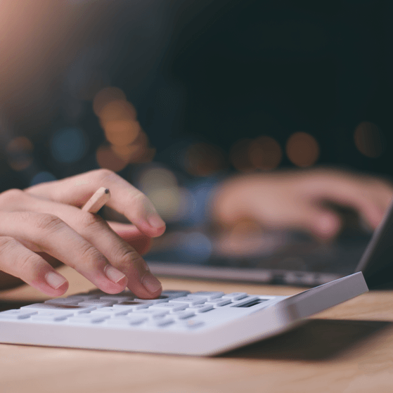 A business owner reviews the company accounts