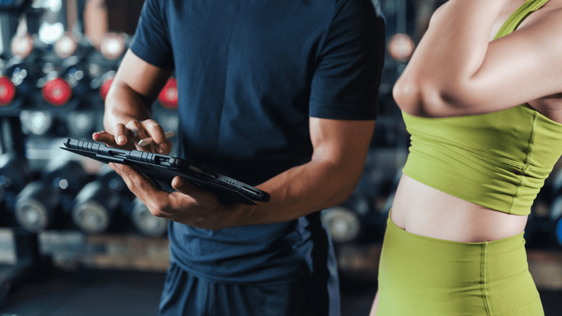 A coach analyses an athletes performance