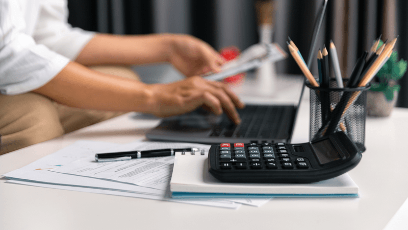 A company director calculates debts