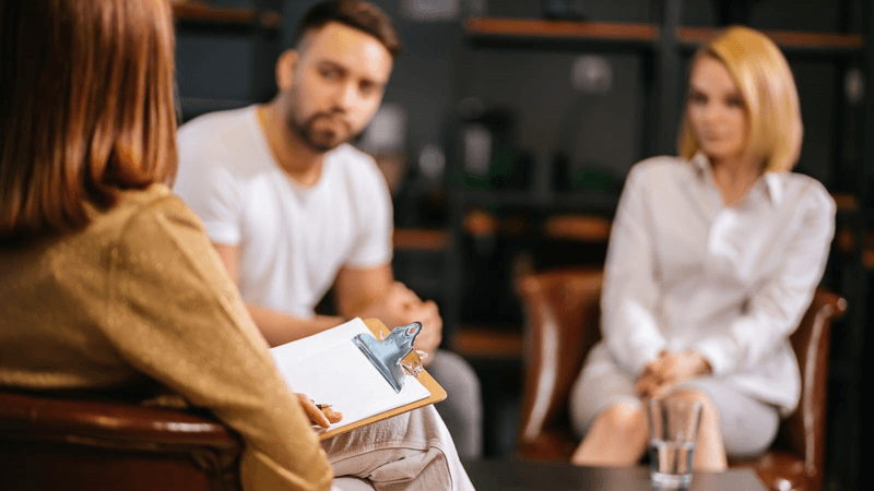 A divorcing couple attend mediation