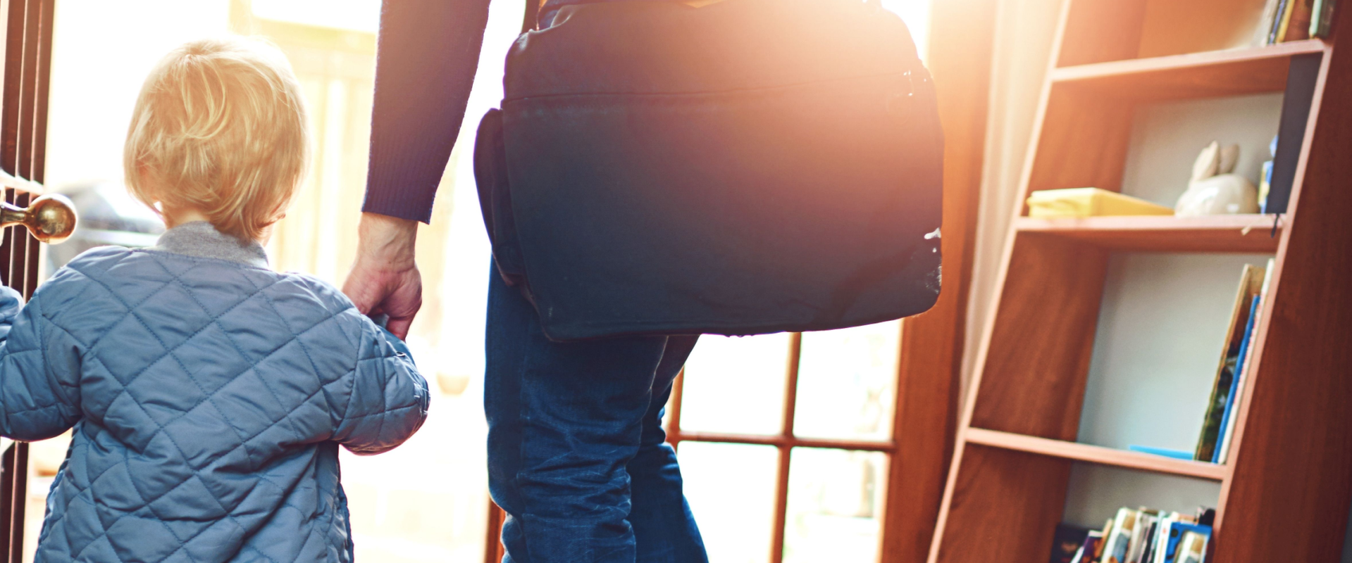 A parent and child leave the house