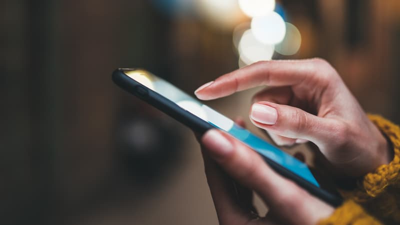 A person uses a mobile phone