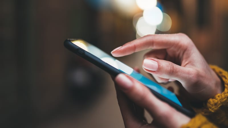 A person uses a mobile phone