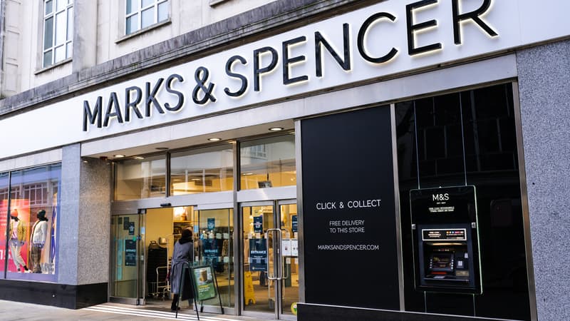 A shopper enters a Marks and Spencer store_Editorial Use Only Credit Line: salarko