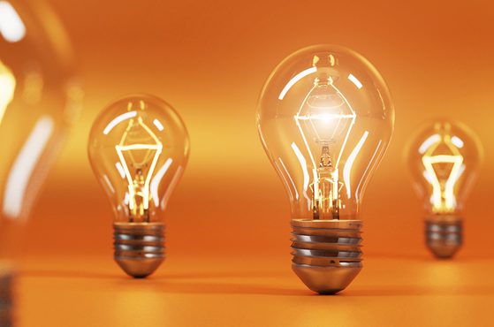 Bulbs shining against orange background