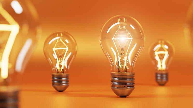 Bulbs shining against orange background