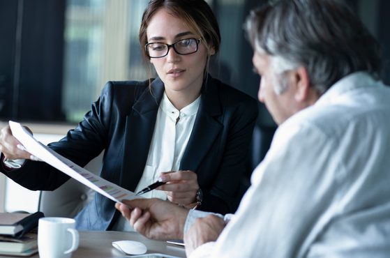 Business owner agreeing contract with bank employee