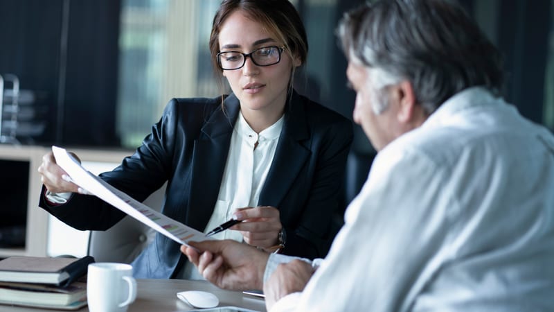 Business owner agreeing contract with bank employee