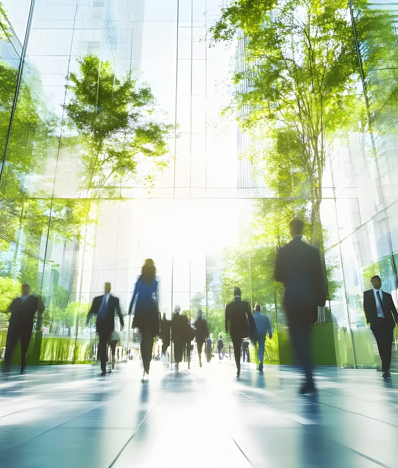 Business people walking between office buildings green environment blur