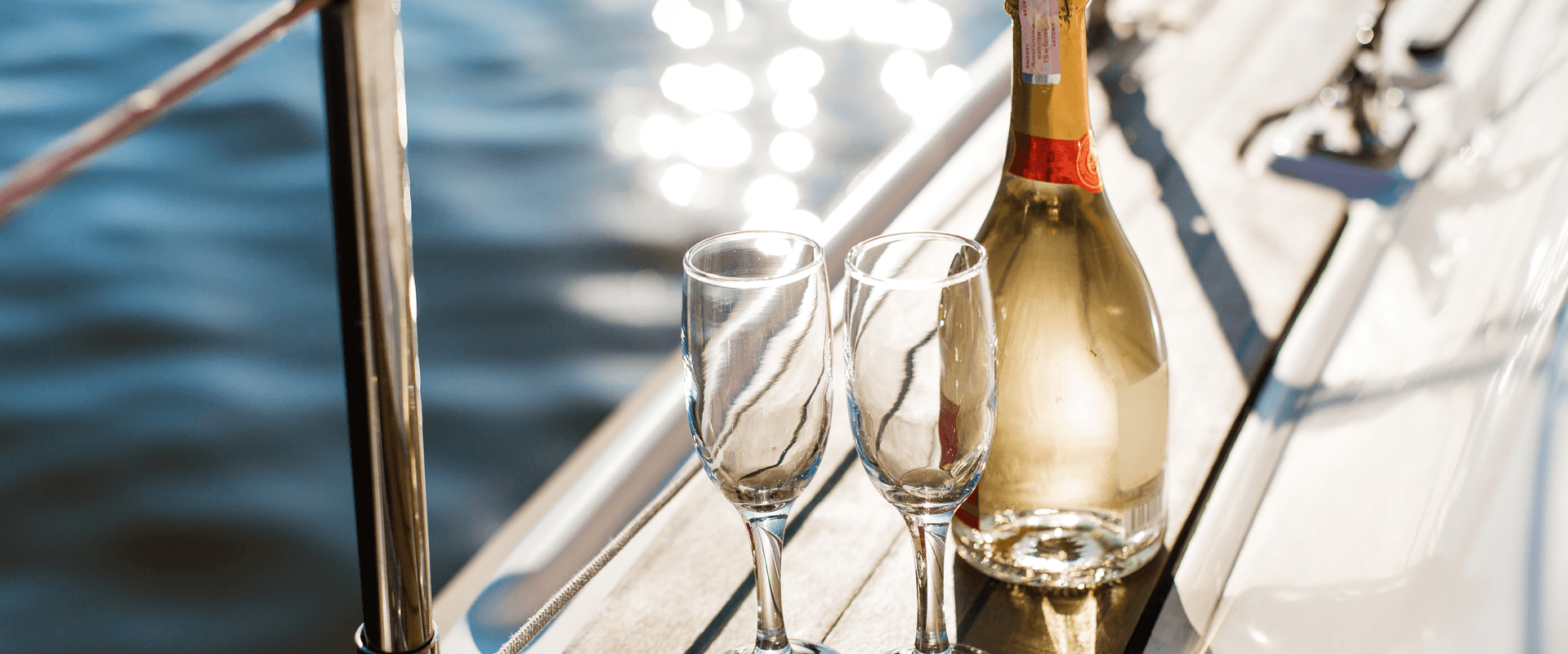 Champagne toast on a luxury boat header
