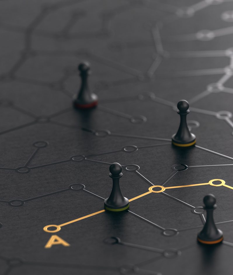 A black game board with grey and yellow connected points, featuring black playing pieces and marked with the letters A and B.