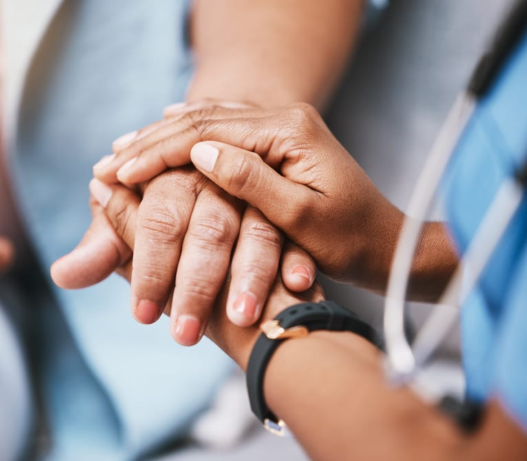 Empathy trust and nurse holding hands with patient for help consulting support and healthcare advice