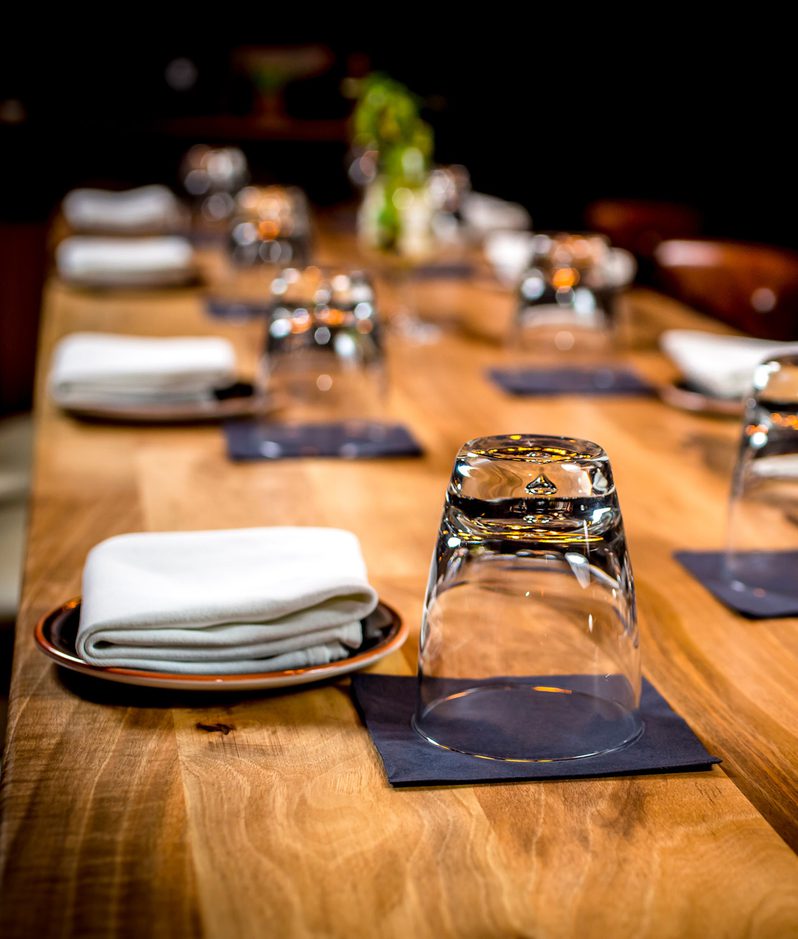 Empty chairs at restaurant table