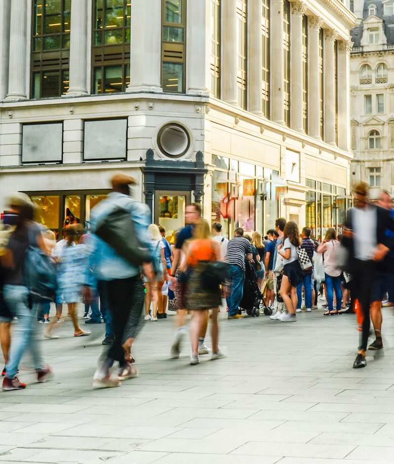 High street London busy crowd blurred