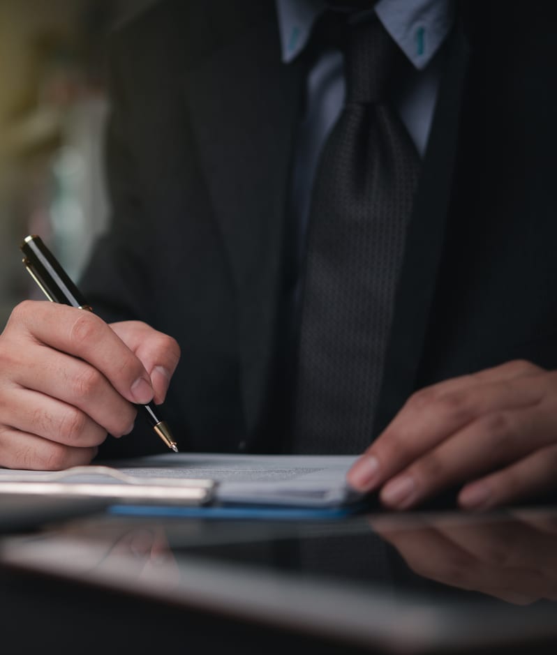 Lawyer signing contract