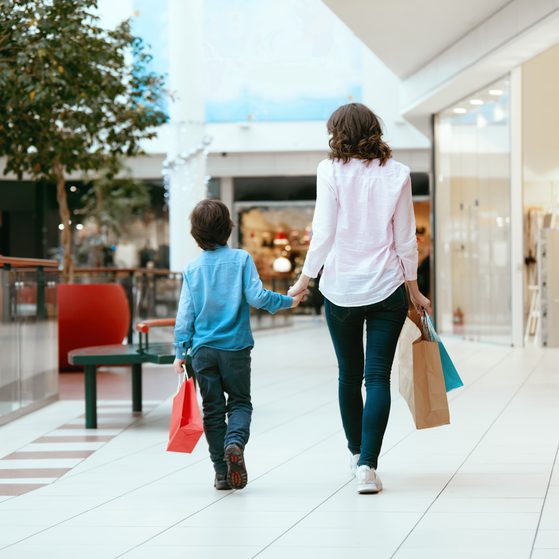 Mother and child in shopping centre