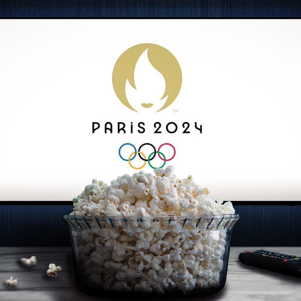 Paris 2024 Olympic games logo on television screen behind bowl of popcorn