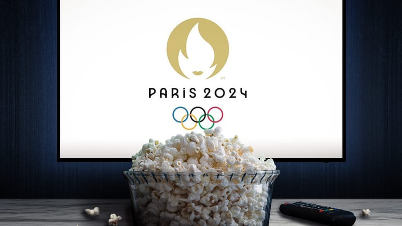 Paris 2024 Olympic games logo on television screen behind bowl of popcorn