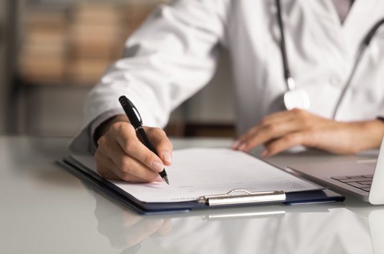 Professional conduct doctor writing form