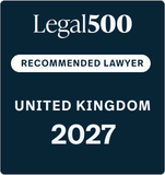 Dark blue rounded-square badge with the Legal500 branding, a white pill label RECOMMENDED LAWYER, and UNITED KINGDOM 2027 in white text.