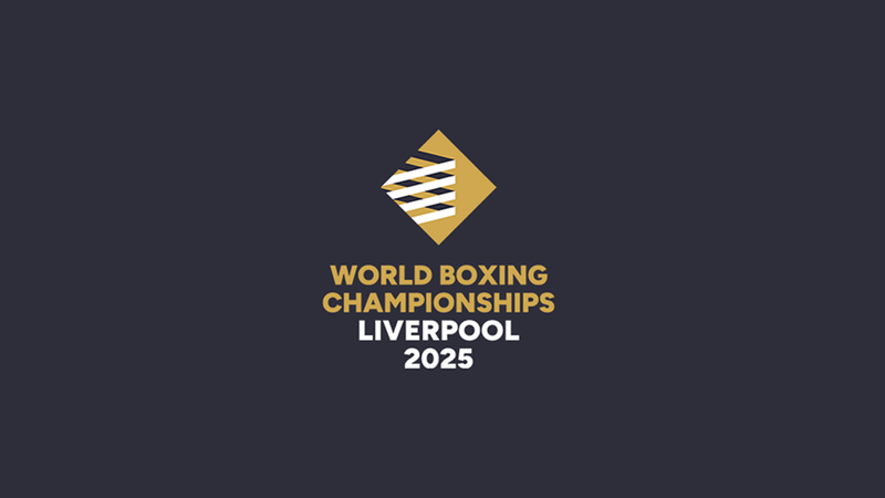 A dark grey background featuring a triangular logo with black, white, and gold stripes, and text reading "World Boxing Championships Liverpool 2025" beneath it.