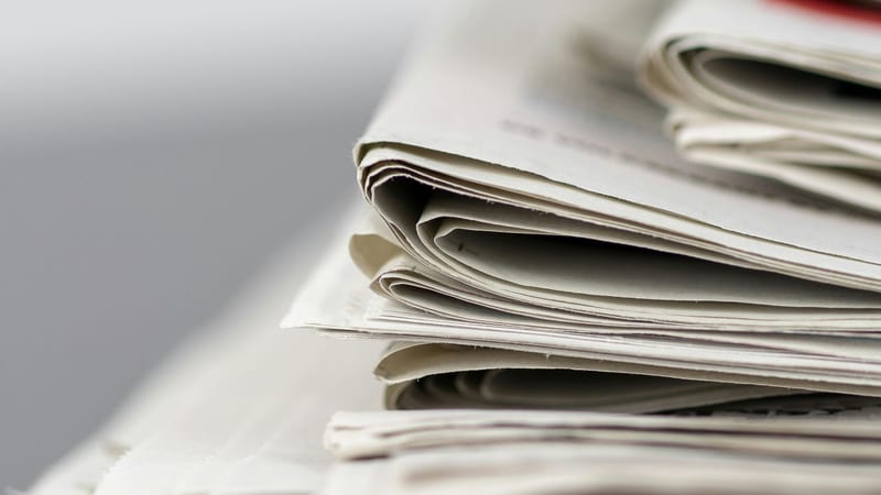 A stack of newspapers