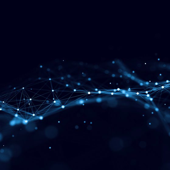 A digital abstract image with interconnected blue points and lines on a dark background, resembling a network or galaxy.