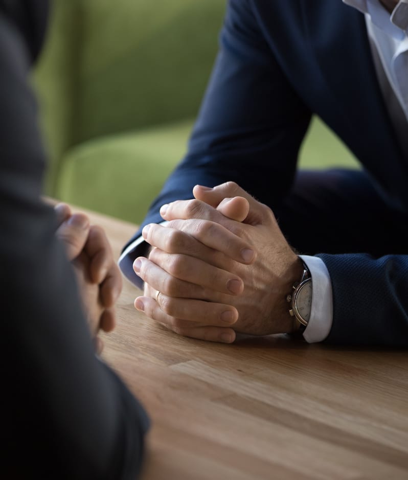 Business disagreement across table