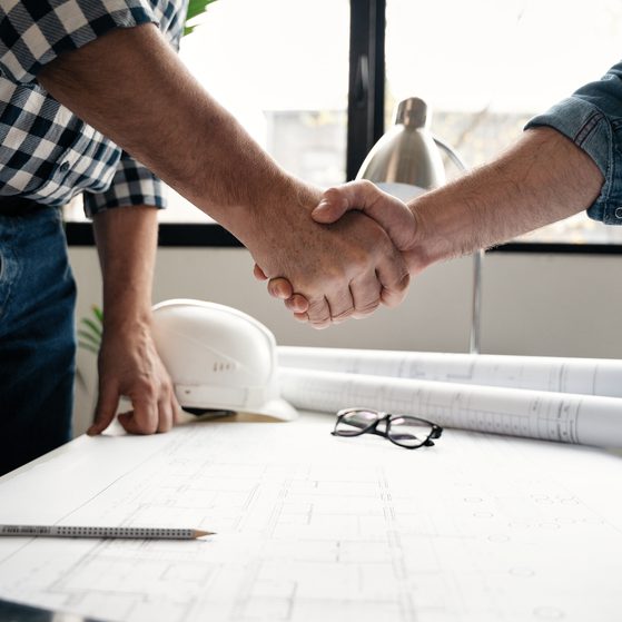 Construction shaking hands