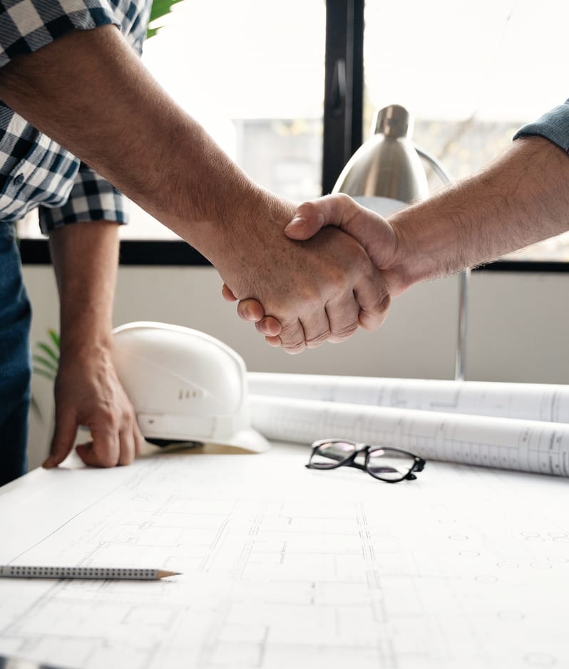 Construction shaking hands