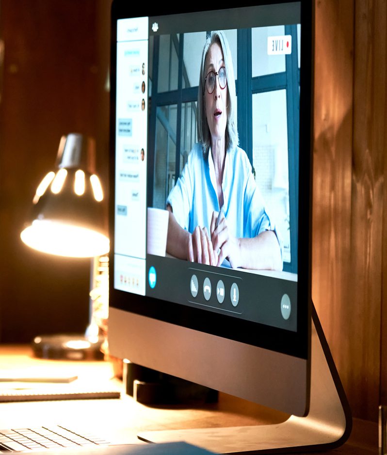 Man watching webinar on pc