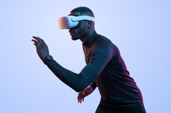 Man with VR headset playing sport