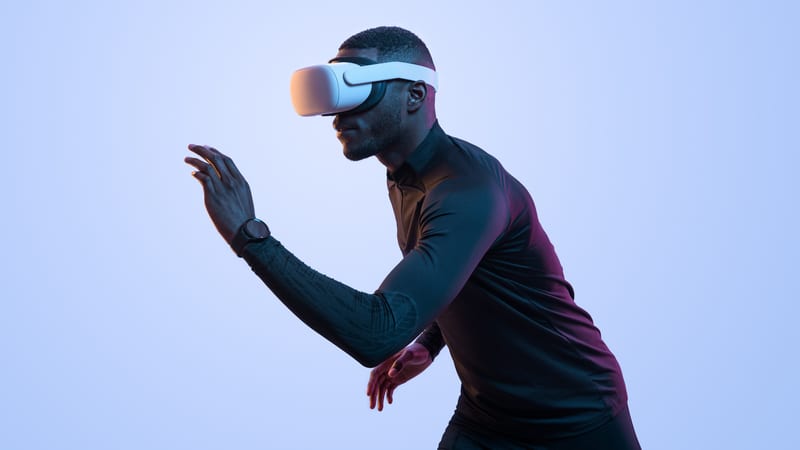 Man with VR headset playing sport