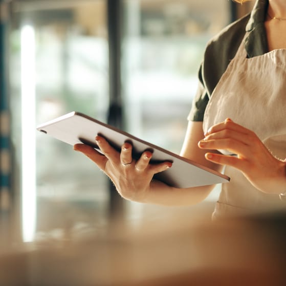 Shopkeeper using tablet device