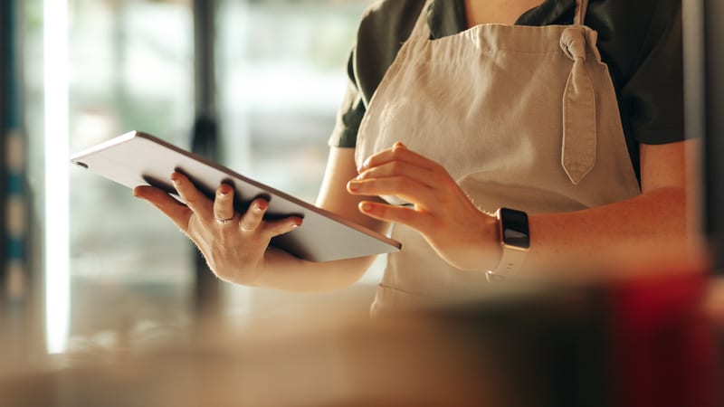 Shopkeeper using tablet device