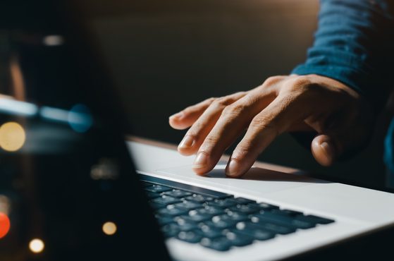 Working on laptop at night bokeh