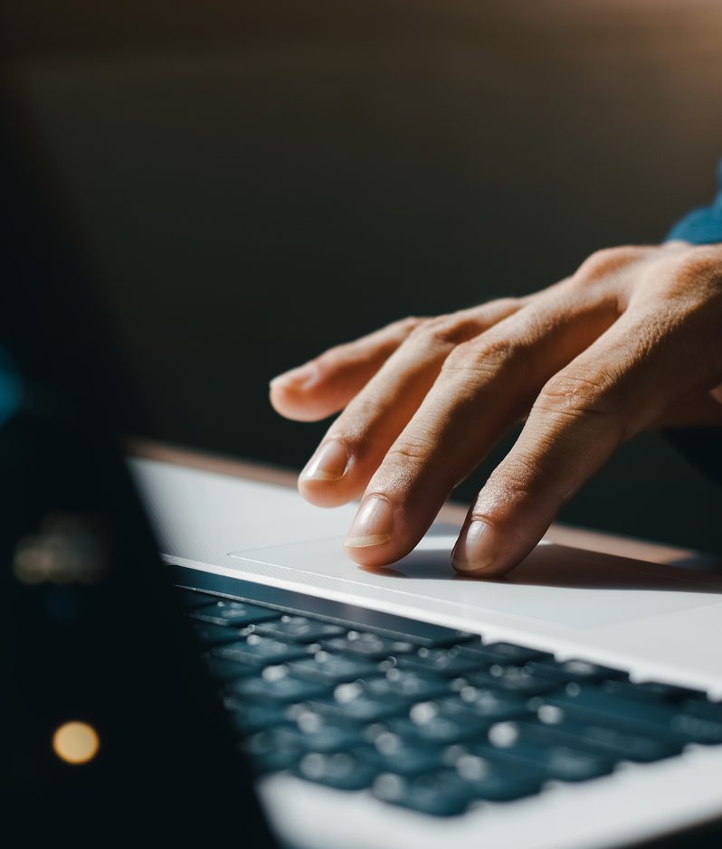 Working on laptop at night bokeh