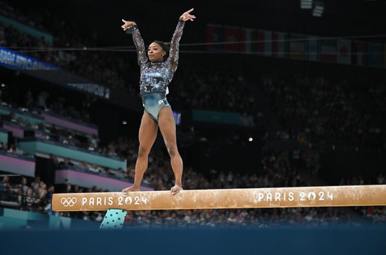 Simone Biles of team USA competes on the balance beam during the Artistic Gymnastics Womens Qualification at the the Olympic Games Paris 2024 large