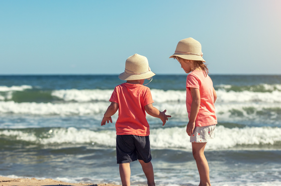 Siblings on a holiday at the beach